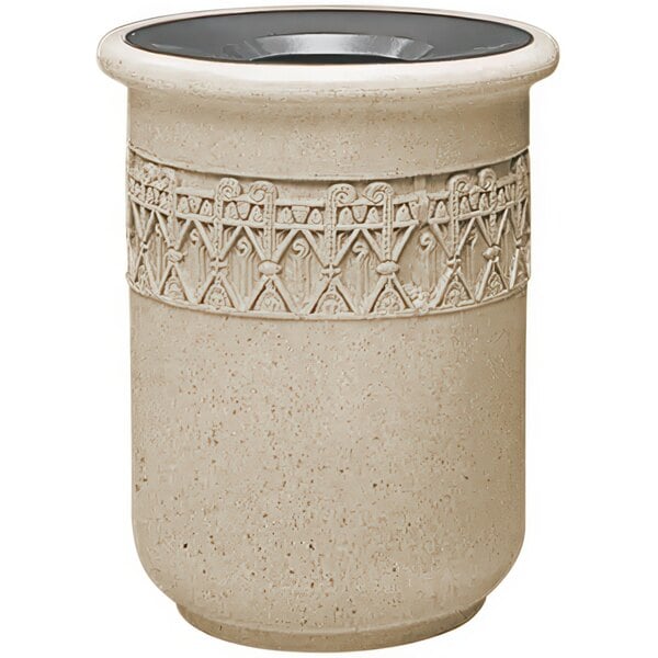 A beige Wausau Tile concrete outdoor waste receptacle with a black aluminum funnel lid.