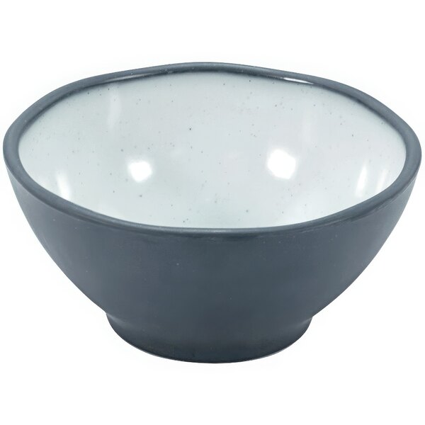 A Dalebrook steel blue melamine bowl with a white rim and gray speckles.