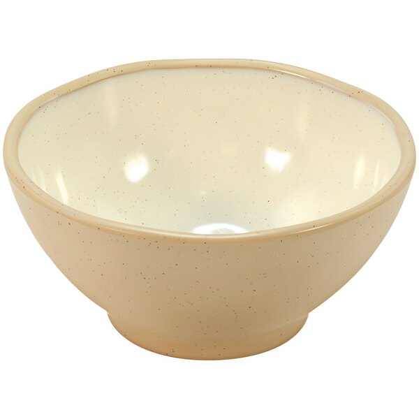 A white melamine bowl with speckled beige specks.