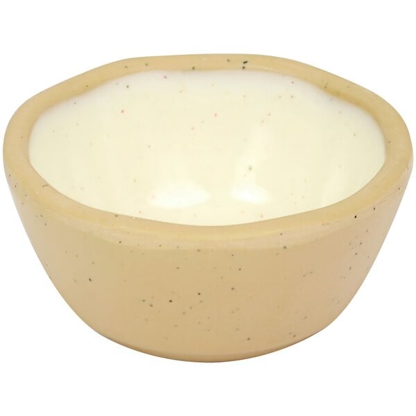 A white Dalebrook melamine ramekin with black speckles.