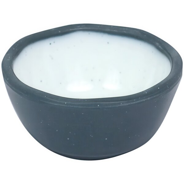 A Dalebrook steel blue melamine ramekin with a white rim and black speckles.