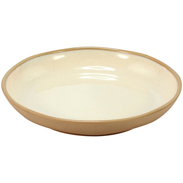 A white bowl with a tan rim.