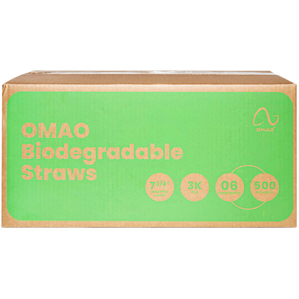 A green OMAO box with pink text and a green and orange label with a number and a leaf.