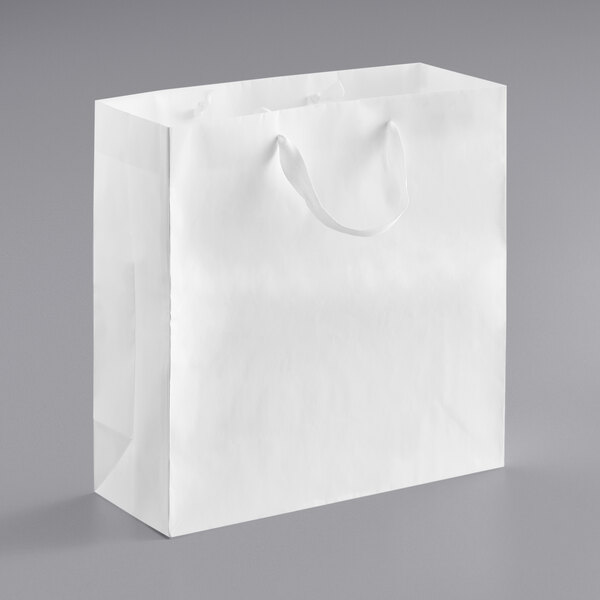 A customizable white paper bag with ribbon handles.