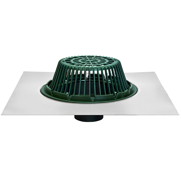 A green polypropylene drain cover on a white surface.