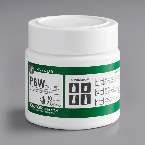 A white container of Five Star PBW cleaning tablets with a green label.