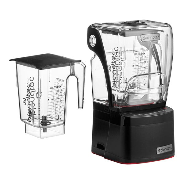 A Blendtec Stealth blender with a WildSide+ container next to it.