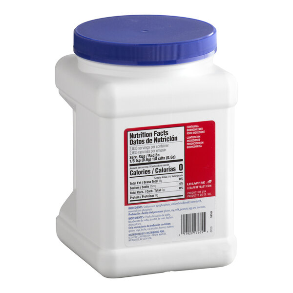 A white plastic canister with a blue lid containing double acting baking powder.