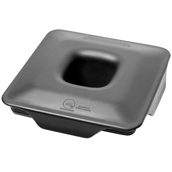 A black square latching lid with a hole in the middle.