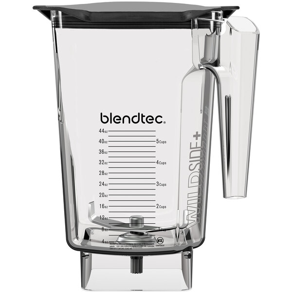 A clear Blendtec blender jar with a clear lid and handle.