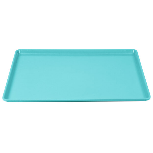 A blue rectangular Cambro dietary tray with a plastic handle.