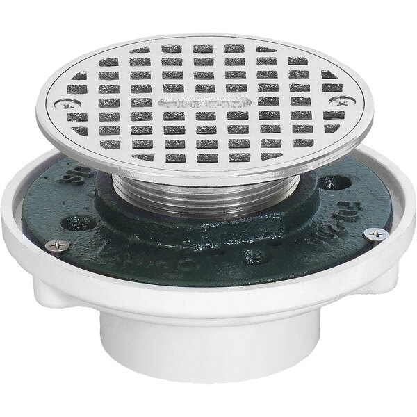 A Josam round PVC floor drain with a chrome-plated brass strainer over a white drain.