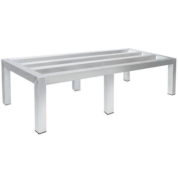 An Advance Tabco aluminum dunnage rack with four legs.