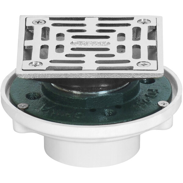 A metal floor drain with a square base and a chrome strainer.