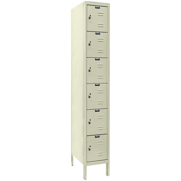 A tan metal locker with six compartments.