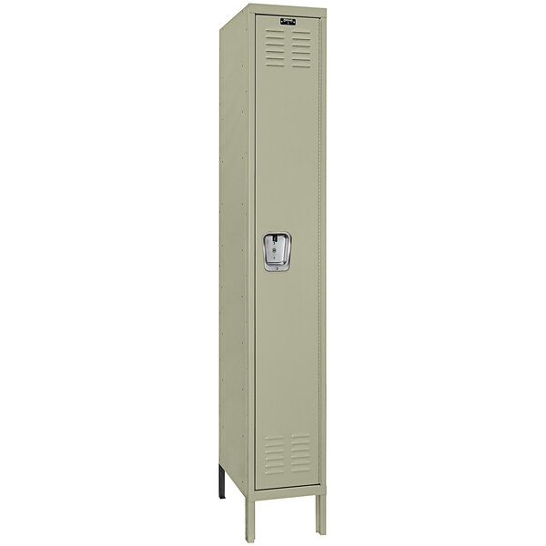 A tall beige metal locker with a recessed silver handle.