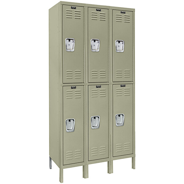 A group of Hallowell tan triple 2 tier lockers on a white background.