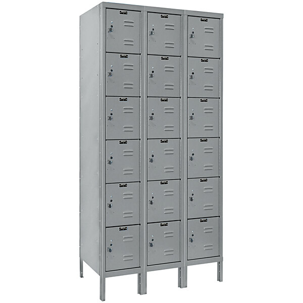 A group of Hallowell grey 6-tier box lockers.