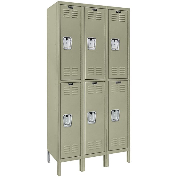 A group of Hallowell tan triple lockers with recessed handles.