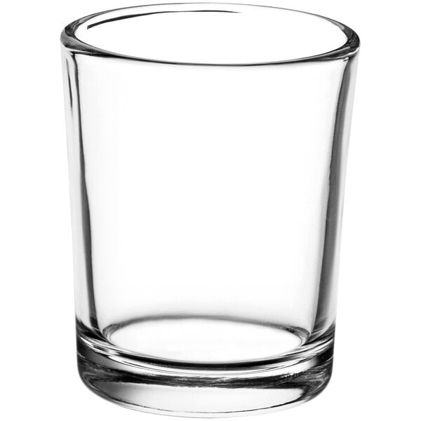 A clear glass Acopa votive holder with a curved rim.