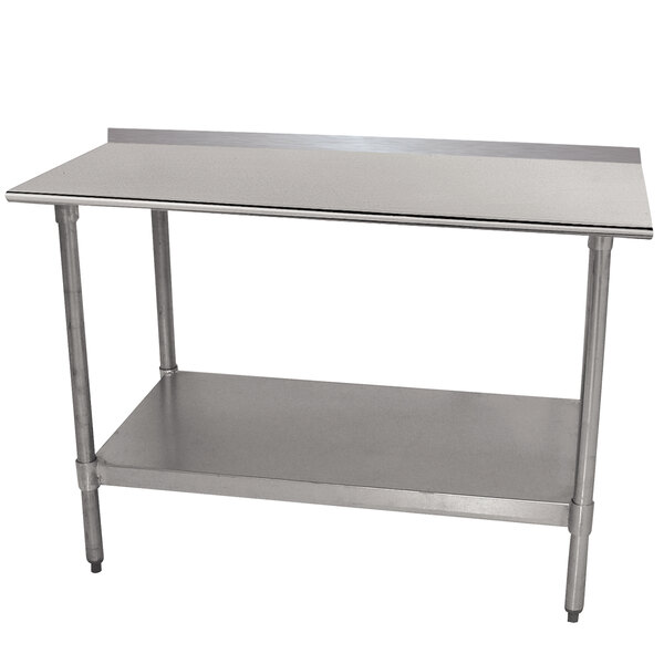 An Advance Tabco stainless steel work table with a shelf.