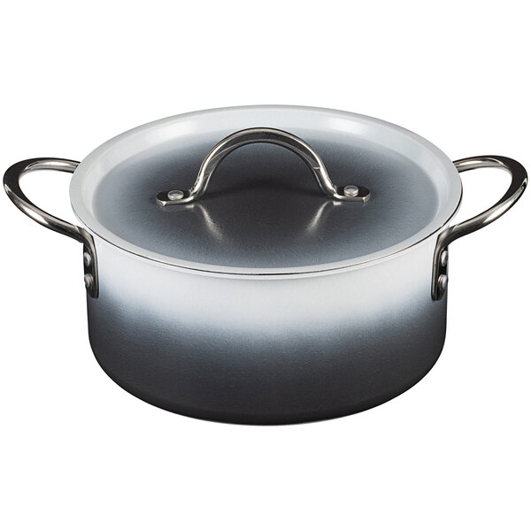 A Bon Chef Country French Ombre Shadow Gray sauce pot with a handle and cover.