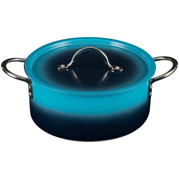 A blue and black Bon Chef Country French sauce pot with a lid.