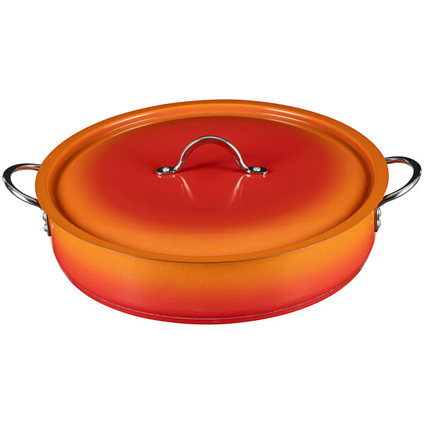 A red and yellow Bon Chef Country French brazier pot with a handle and lid.
