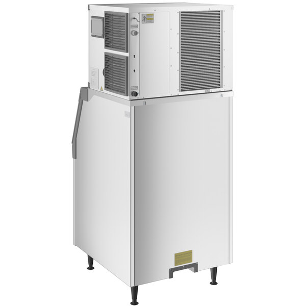 An Avantco air cooled modular half cube ice machine with a door open.