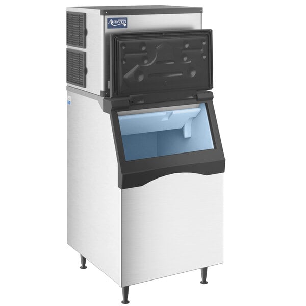 An Avantco air cooled ice machine with a door open.