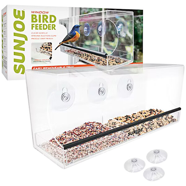 A Sun Joe window bird feeder with a bird on it.