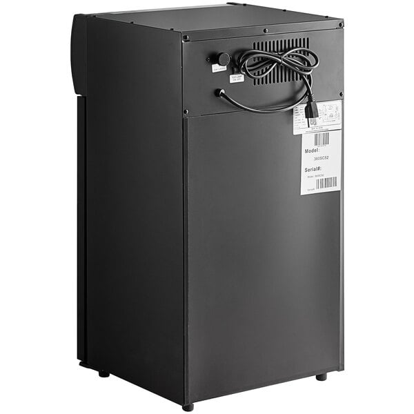 An Avantco black countertop display refrigerator with a swing door.