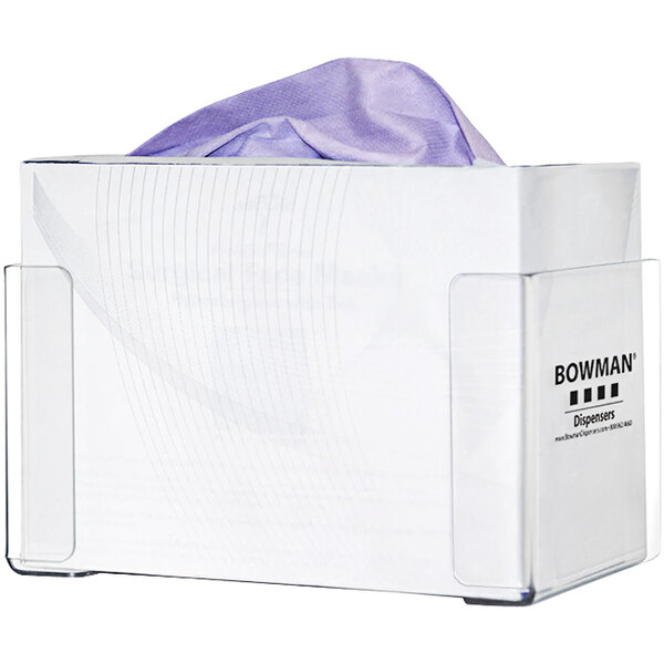 A white box with a clear plastic front holding a purple cloth.