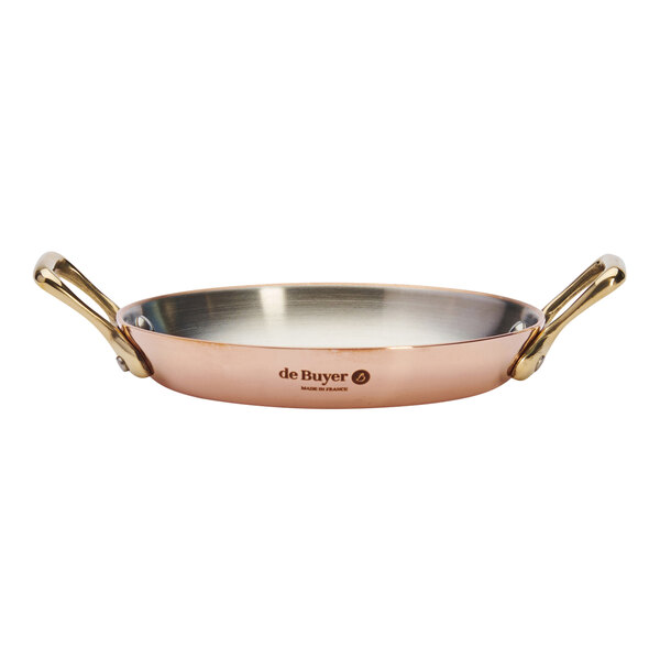 A de Buyer copper fry pan with dual handles.