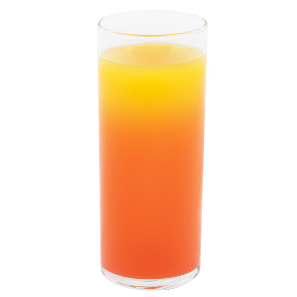 A Libbey straight sided glass filled with orange and yellow liquid.