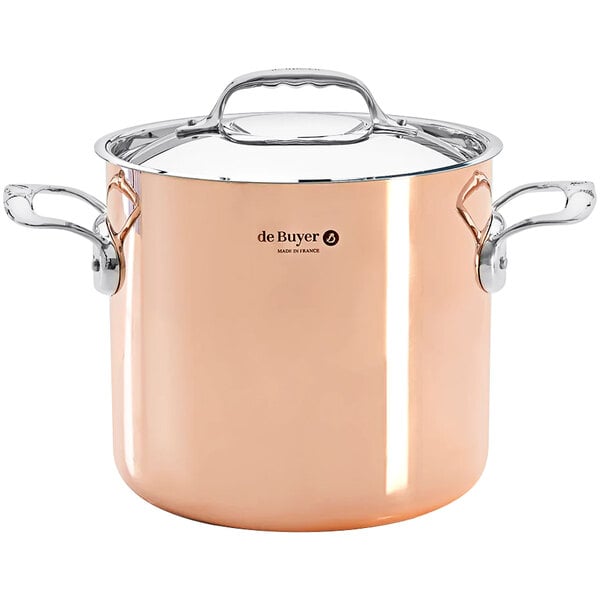 A de Buyer Prima Matera copper stock pot with a lid.