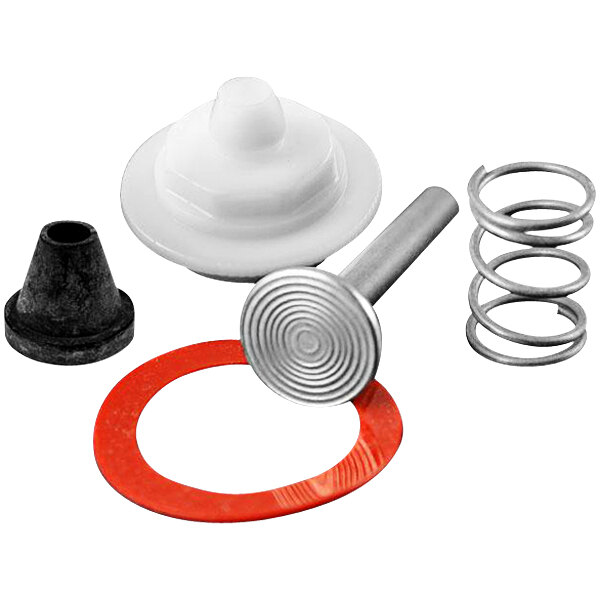 A metal spring, metal cone, and white plastic nut in a Sloan B-51-A handle repair kit.