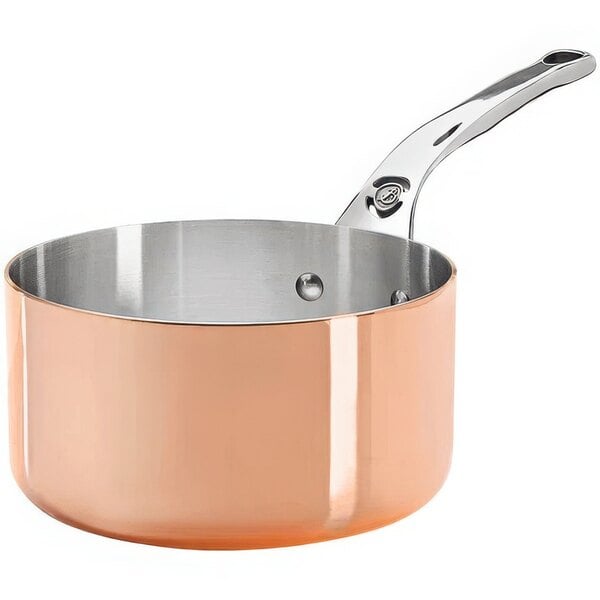 A de Buyer copper sauce pan with a lid and handle.