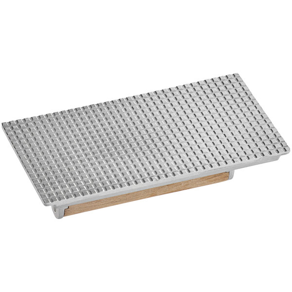 An aluminum rectangular steak weight.