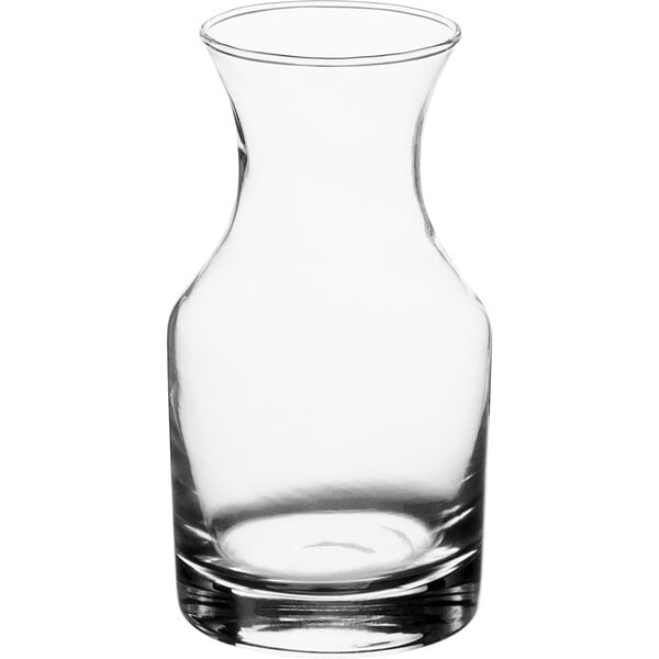 A clear glass Acopa bud vase with a curved neck.