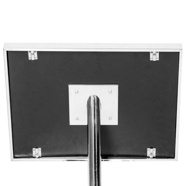 A chrome metal pedestal sign board with a metal pole and base holding a black and silver sign.