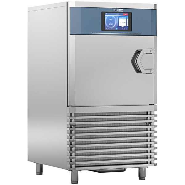 An Irinox stainless steel reach in blast chiller with a blue and silver panel.