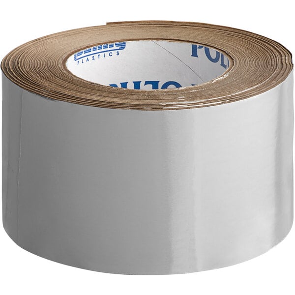 A roll of silver Nashua plain foil tape with brown paper on it.