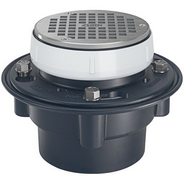 A Zurn floor drain with a white lid and black base over a silver round strainer.