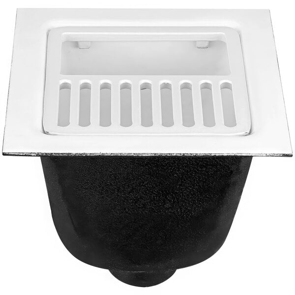 A black and white Zurn floor sink drain with a grate over the drain.