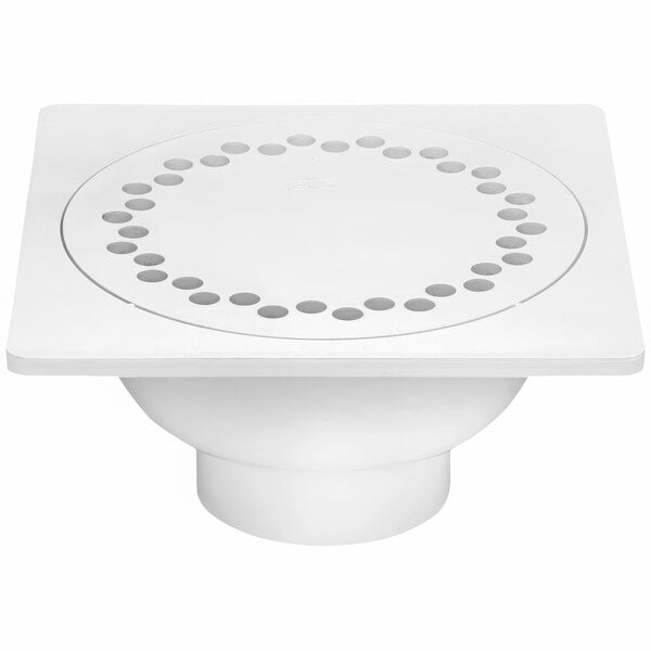 A white square Zurn floor drain with holes in the bottom.
