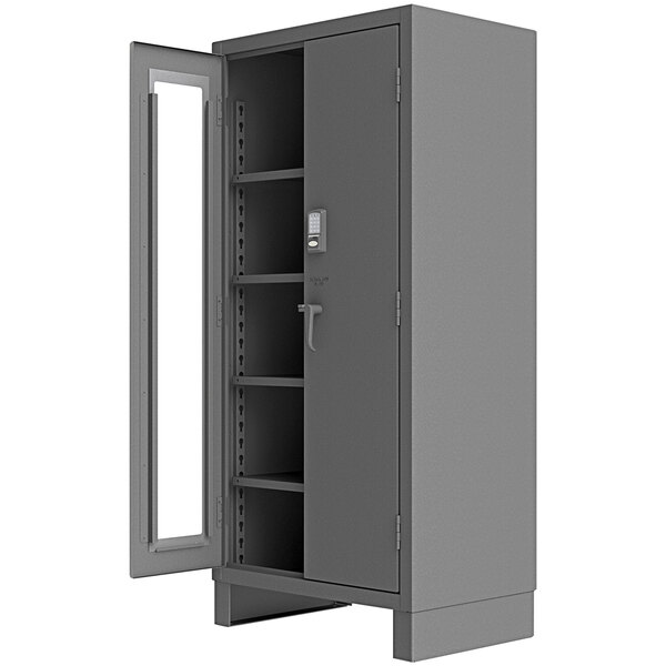 A grey metal Durham Manufacturing storage cabinet with an open door and keypad lock.