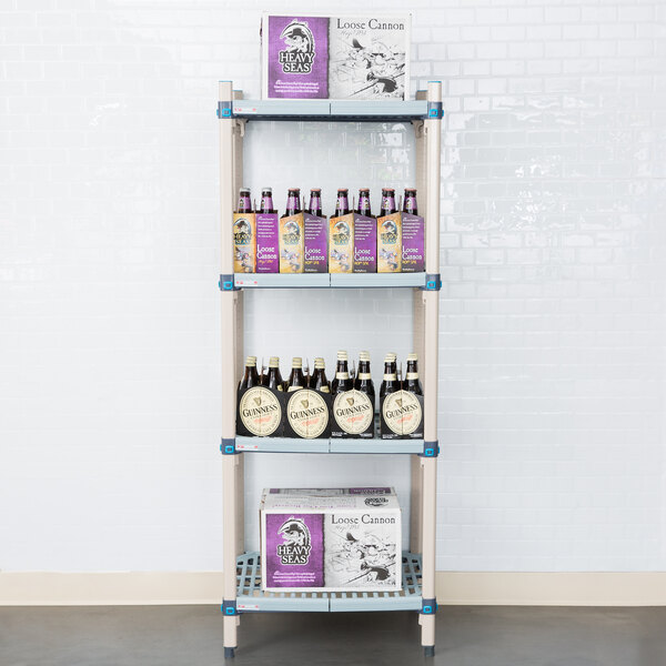 A MetroMax Q shelf with bottles and boxes on it.