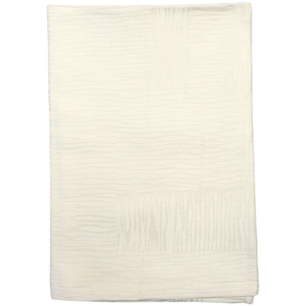 A folded white Garnier-Thiebaut cloth napkin with a pattern.