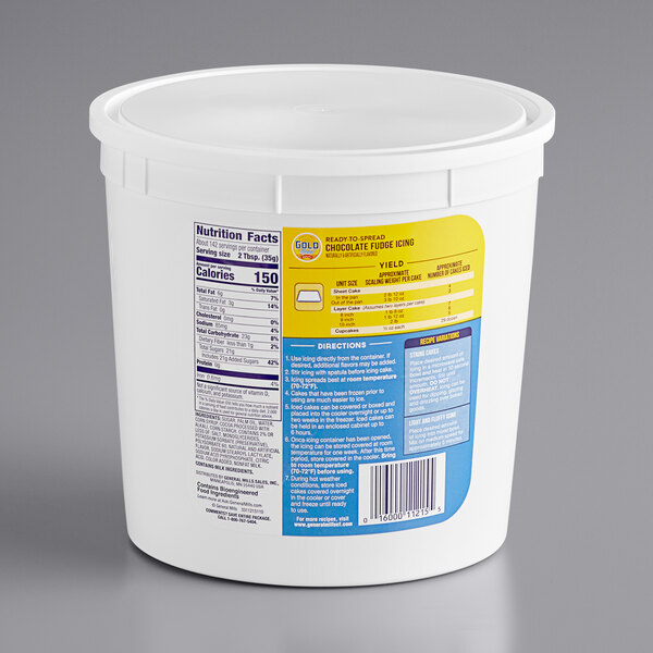 A white container of Gold Medal Ready-to-Spread Chocolate Fudge Icing with a yellow label.
